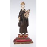 "Saint Anthony". Carved and polychromed wooden and ivory sculpture. Colonial. Hispanic-Philippine.
