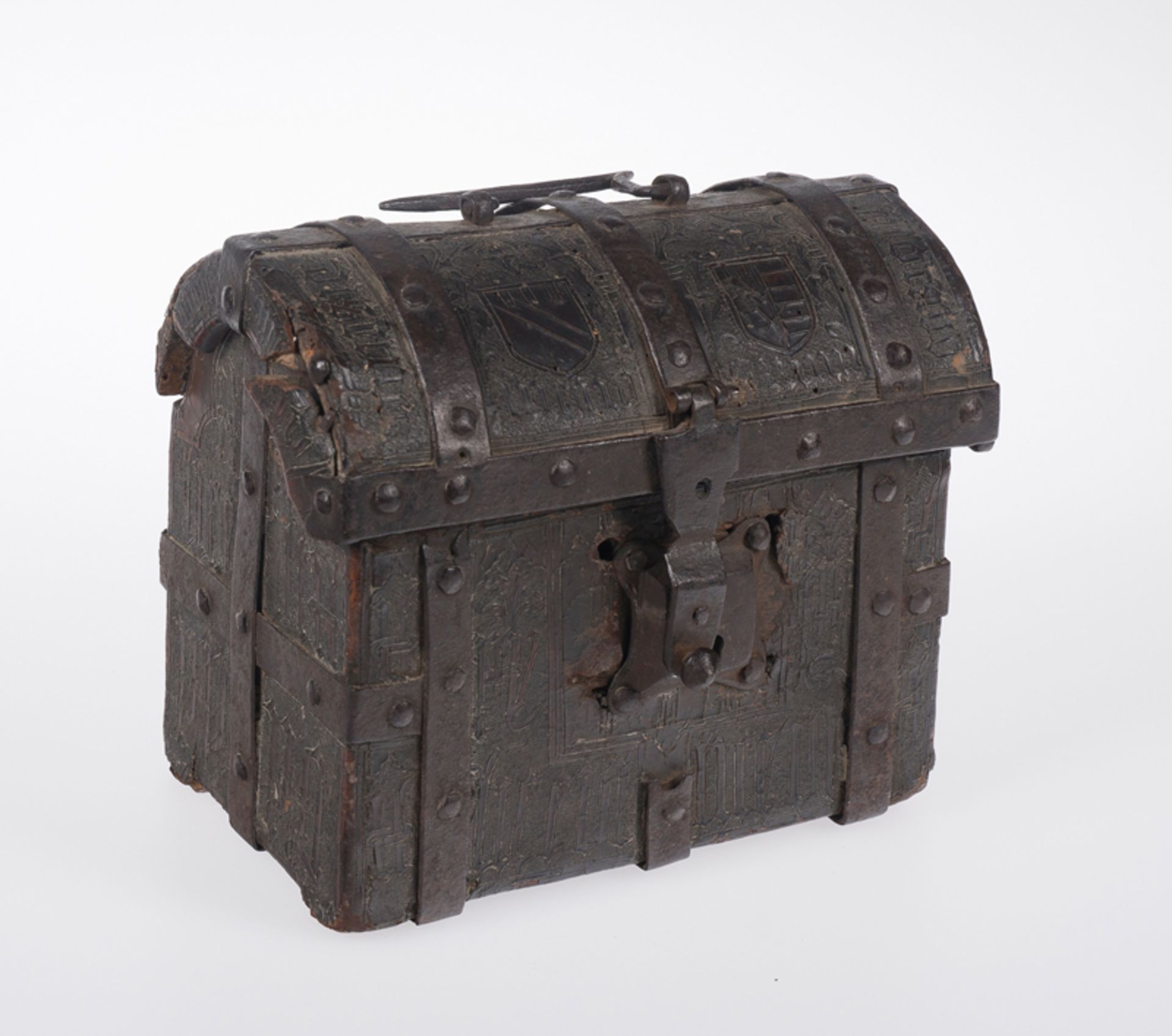 Wooden chest covered in embossed and engraved leather, with iron fittings. Gothic. 15th century.