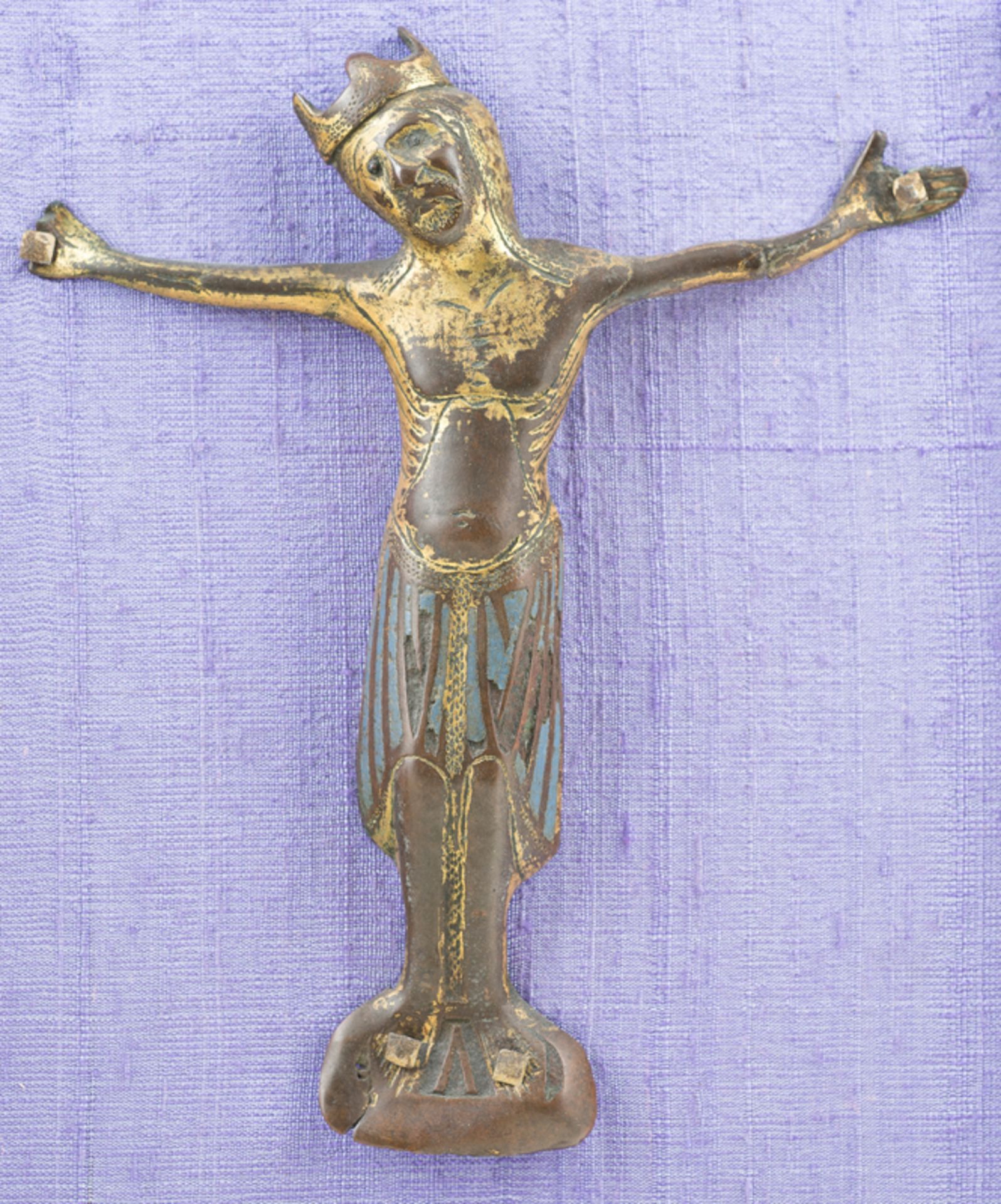Gilded copper Christ with champlevé enamel. Limoges. France. Romanesque. 13th century.<br>Gilded cop