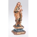 "Saint Joseph and the Child". Carved and polychromed wooden sculpture. Colonial School. 18th