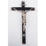"Christ". Chased silver figure and ebony cross. Italy. 16th century."Christ". Chased silver figure