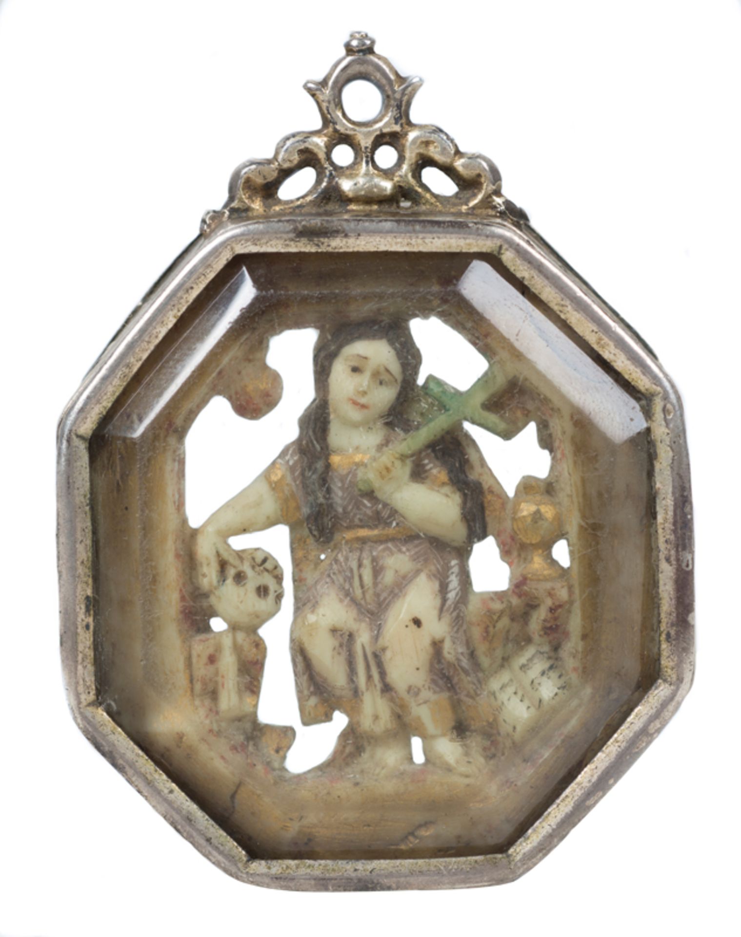 Large silver, rock crystal and polychromed ivory medallion with gilt residue. 16th century.Large