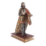 "Conquistador". Carved, gilded and polychromed wooden sculpture. Possibly Colonial School. 17th cent