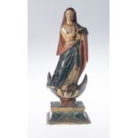 "Our Lady Immaculate". Polychromed and gilded huamanga stone sculpture. Colonial. 18th century.