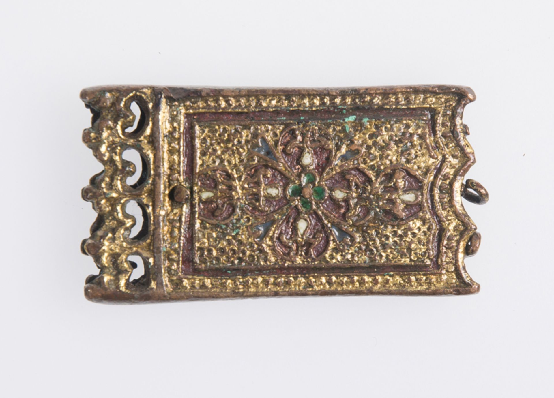 Chased, gilded and enamelled bronze buckle or ornament. Possibly Nasrid. 14th - 15th century.