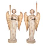 Exceptional pair of carved, polychromed and gilded poplar wood torch bearing angels. Tuscany, Sienna