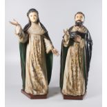 "Saint Rose of Lima and Saint Francis". Pair of imposing carved, gilded and polychromed wooden sculp