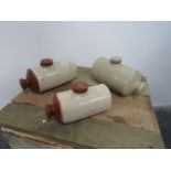 Trio of vintage stoneware bed warmers