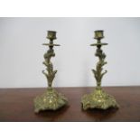 Pair of early 20th century brass candlesticks very ornate. H23 x W11cms