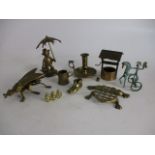 Collection of brass to include wishing well, large fly, candlestick holder etc.