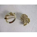 Vintage pair of sarah Cov brooches.