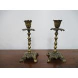 Pair of ornate early 20th century brass candlesticks. H18 x W8cms.