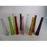 Mixed lot of vintage coloured glass long stemmed vases.