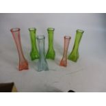 Mixed lot of vintage coloured glass long stemmed vases.