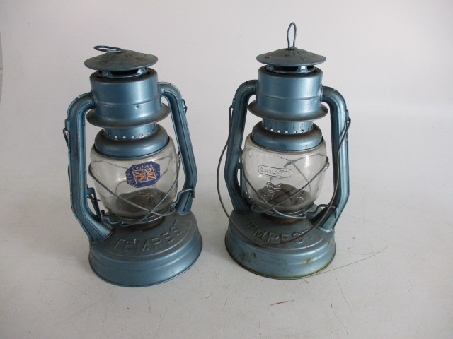 Pair of large tempest tilly lamps.