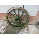 Antique wooden wheel wooden so]pokes with steel tread painted in showman style