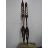 Pair of vintage carved wooden African crocodile spears. Tourist pieces .131cm high