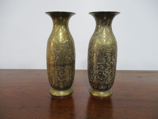 Miniature pair of engraved brass vases. H12 x W5cms.