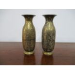 Miniature pair of engraved brass vases. H12 x W5cms.