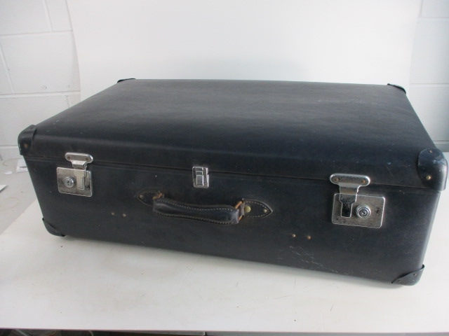 Vintage large globe trotter travel suitcase.