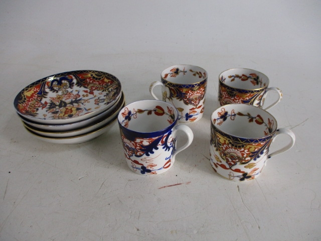 Set of 4 Imari style cups and saucers.