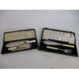 Pair of vintage cased fish server sets, one has mother of pearl handles.