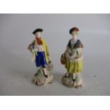 Pair of vintage porcelain figurines.