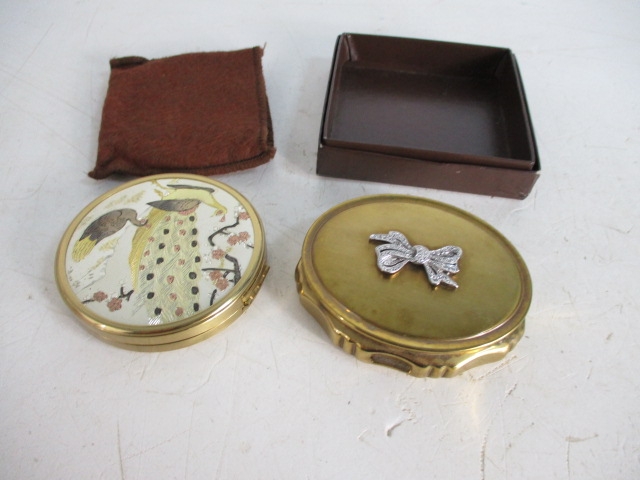 Pair of vintage ladies compacts to include Kigu.