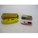 Sutcliffe model Comet clockwork speedboat, along with super jet speed boat.