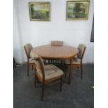 Mid century Mackintosh retro extendable table and chairs, in original condition. Diameter 120cm x