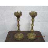 Pair of gothic brass candle sticks