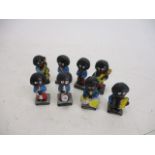 Vintage Robertson's golly band figures.