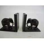 Pair of possibly ebony wooden carved elephant book ends.