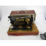 Vintage Jones sewing machine cased