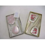 Boxed pair of vintage dressing table sets