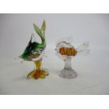 Large pair of Murano glass fish in pedestals.