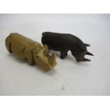 Pair of wooden carved rhino's.