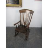 Early 20th century oak rocking chair.
