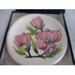 Moorcroft magnolia plate limited edition 75/94, 10 inch diameter, boxed.