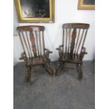 Pair of early 20th century oak rocking chairs.