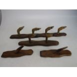 Collection of taxidermy coat hooks to include deer feet and horns