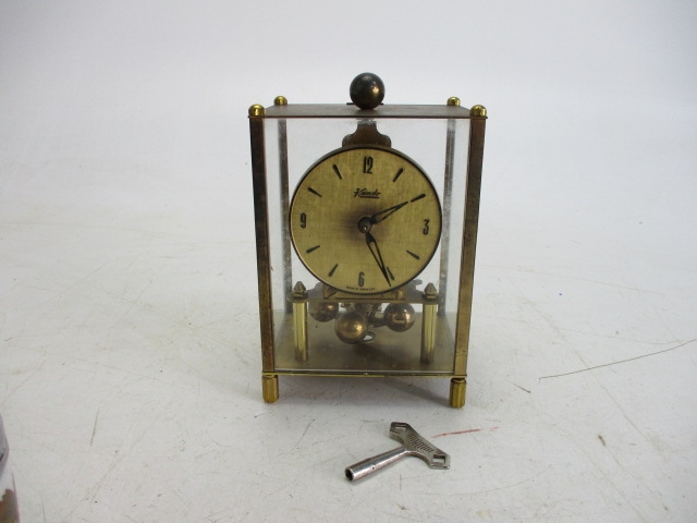 Vintage Kundo glass panelled German mantle clock, with key.