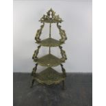 Vintage heavy brass corner shelf. H114 x L57 x W42cms.