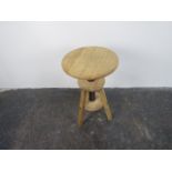 Modern adjustable wind down stool.