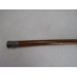 Antique walking stick with white metal top with The Lancashire Fusiliers badge and copper end