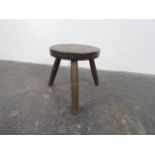 Early 20th century milking stool 21cms high.