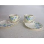 Pair of Crown Devon teacups and cake saucers.