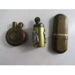 Trio of trench art lighters
