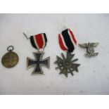 German WW II merit medal, iron cross with second award bar & war merit cross with swords.