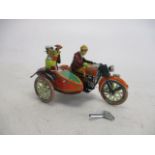 Tinplate motorbike and sidecar, with key.